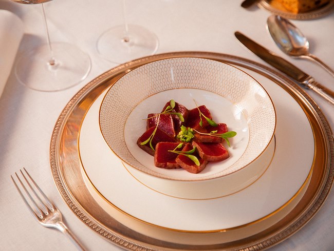 A detail shot of dish of tuna tataki